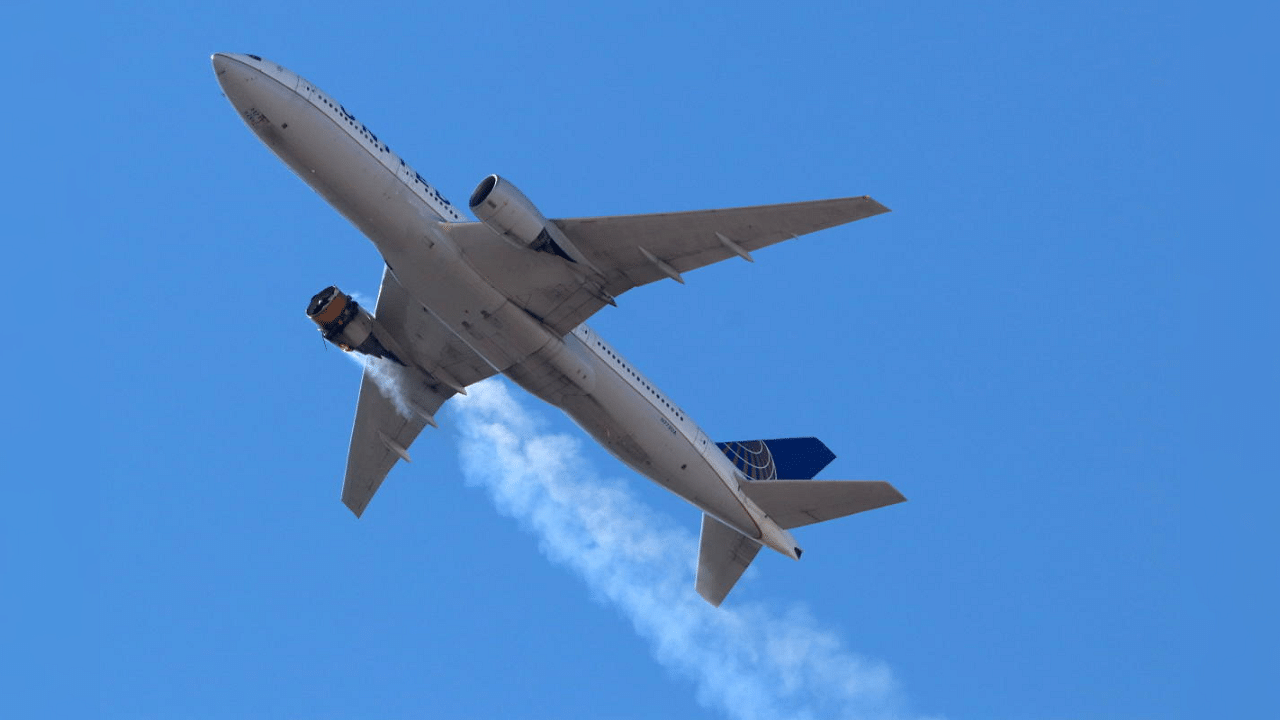 United Airlines flight UA328, carrying 231 passengers and 10 crew on board, returns to Denver International Airport with its starboard engine on fire after it called a Mayday alert, over Denver, Colorado, U.S. February 20, 2021. Credit: Hayden Smith/@speedbird5280/Handout via Reuters