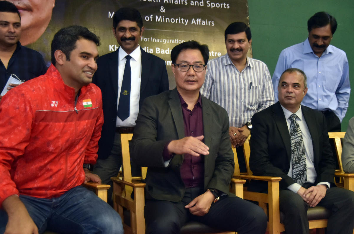 Chief Coach Anup Sridhar, Minister of State Ministry of Youth Affairs and Sports & Ministry of Minority Affairs Kiren Rijiju and KBA President Manoj G Hospetimatth during the inauguration of Khelo India Badminton Centre & KBA Intra Academy Championship at Karnataka Badminton Association in Bengaluru. Credit: DH photo. 