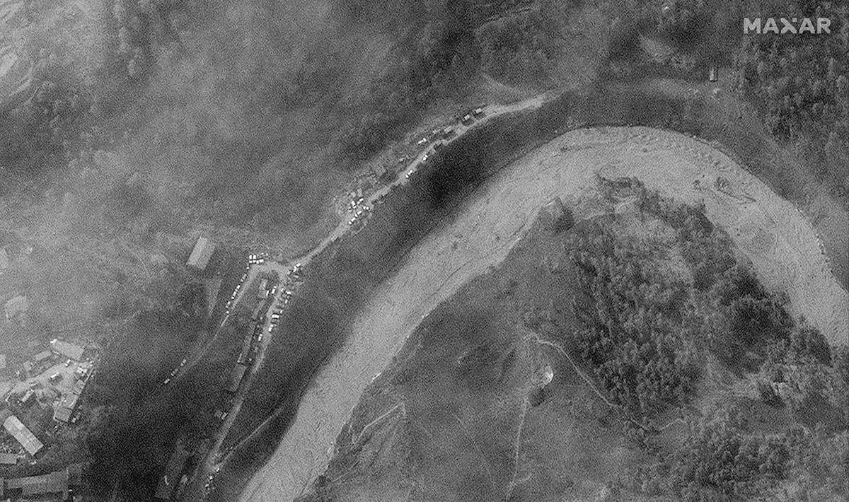 Maxar's WorldView-1 satellite image shows a closer view of vehicles at the National Thermal Power Corporation's (NTPC) under-construction Tapovan Vishnugad Hydropower plant project along the Dhauliganga River in the Uttarakhand region of India in the aftermath of glacial collapse and flash flood, February 9, 2021. Picture taken February 9, 2021. Credit: Maxar Technologies/Handout via REUTERS