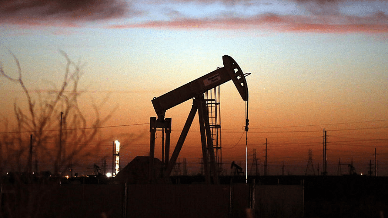  An oil pumpjack works at dawn in the Permian Basin oil field on January 20, 2016 in the oil town of Andrews, Texas. Credit: Getty Images