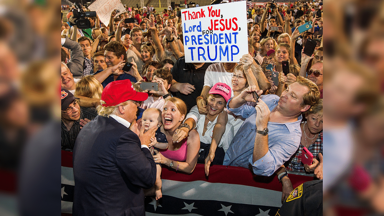 Republican presidential candidate Donald Trump greets supporters after his rally at Ladd-Peebles Stadium on August 21, 2015 in Mobile, Alabama. Credit: Getty Images