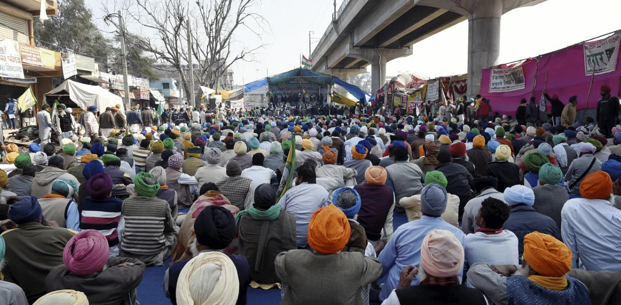 Farmers protest at Tikri border. Credit: PTI Photo