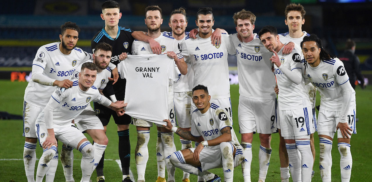Leeds United players pose with a shirt that has "Granny Val" printed on it in memory of the grandmother of Leeds United's Kalvin Phillips after the match. Credit: Reuters Photo
