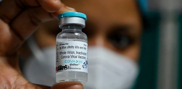 A health staff shows a vial of 'India's first indigenous Covid-19 vaccine, "Covaxin" at the Kolkata Medical College and Hospital in Kolkata. Credit: AFP Photo