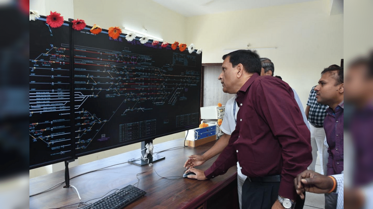 SWR General Manager Ajay Kumar Singh commissioning the electronic interlocking system at Hubballi Railway station on Wednesday. Credit: SWR
