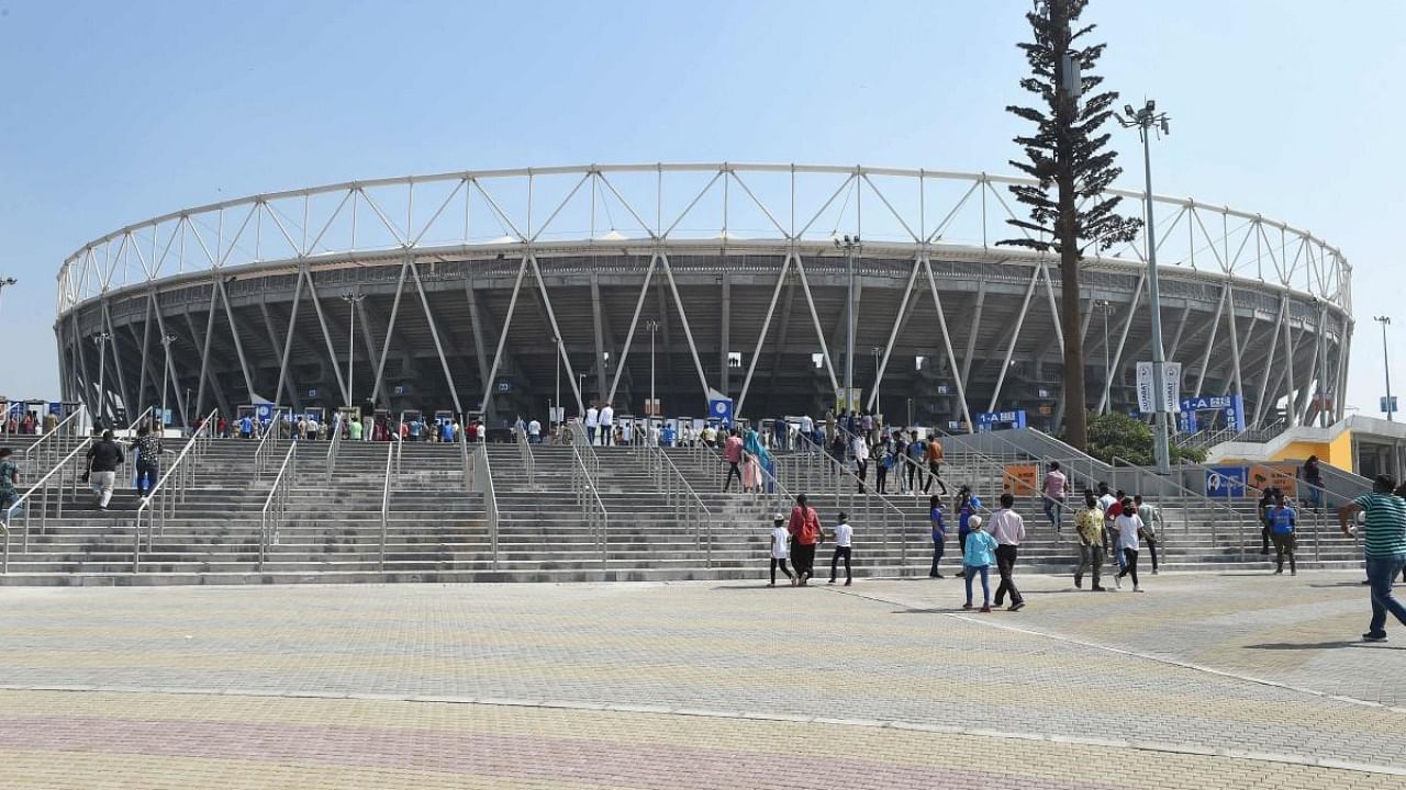 Cricket fans arrive at the Narendra Modi Stadium, the world's biggest cricket stadium, on the first day of the third Test match between India and England, in Motera, on the outskirts of Ahmedabad. Credit: AFP.