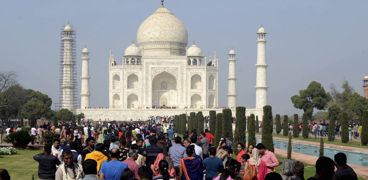 Tourists visit Taj Mahal, on Valentines Day, in Agra. Credit: PTI Photo