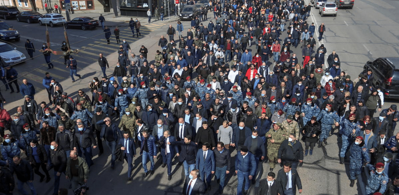 Armenian Prime Minister Nikol Pashinyan and his supporters march during a rally in Yerevan, Armenia. Credit: Reuters Photo