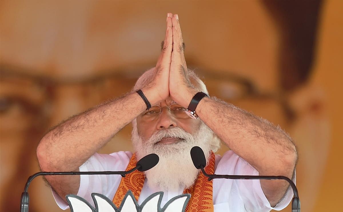 Prime Minister Narendra Modi addresses a public meeting ahead of the assembly election, in Puducherry. Credit: PTI photo. 