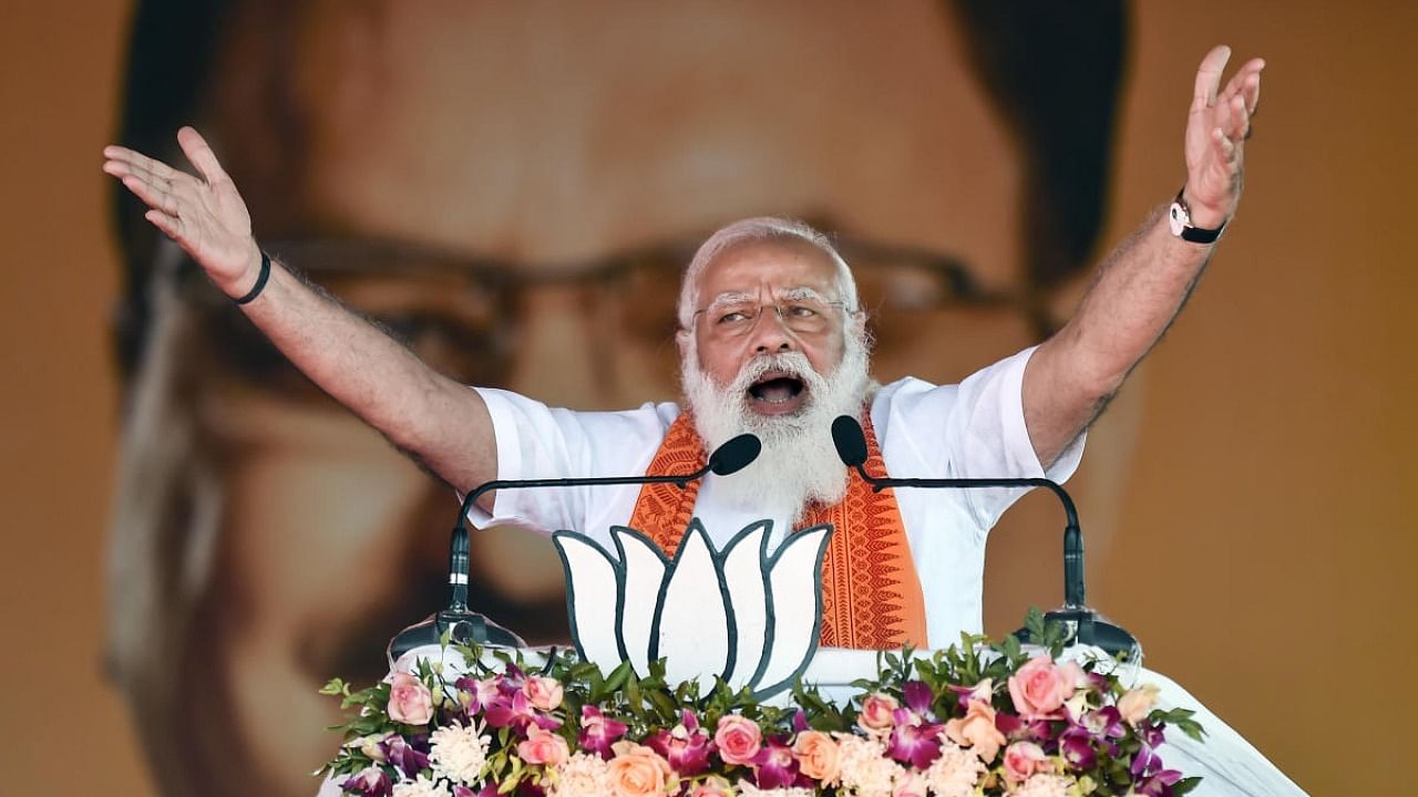 Prime Minister Narendra Modi addresses a public meeting ahead of the Assembly elections, in Puducherry. Credit: PTI.