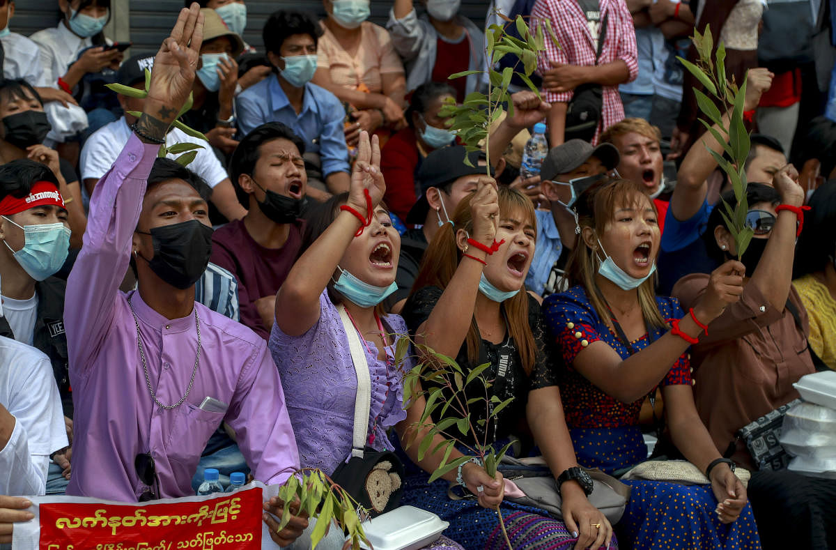 Anti-coup protesters shout slogans in Yangon, Myanmar. Credit: AP photo. 