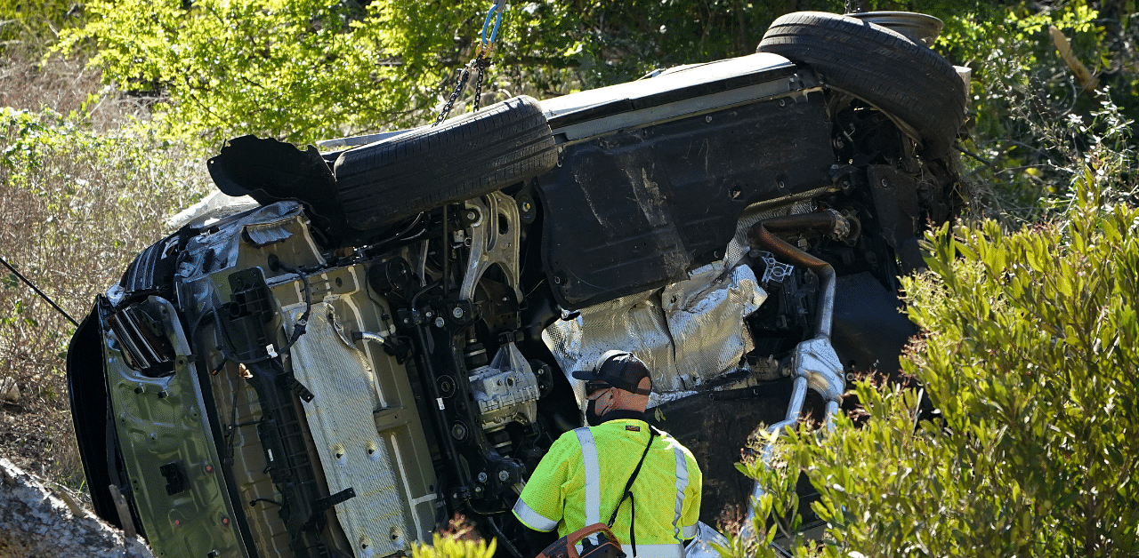 The vehicle driven by golfer Tiger Woods lies on its side in Rancho Palos Verdes, California. Credit: Ap