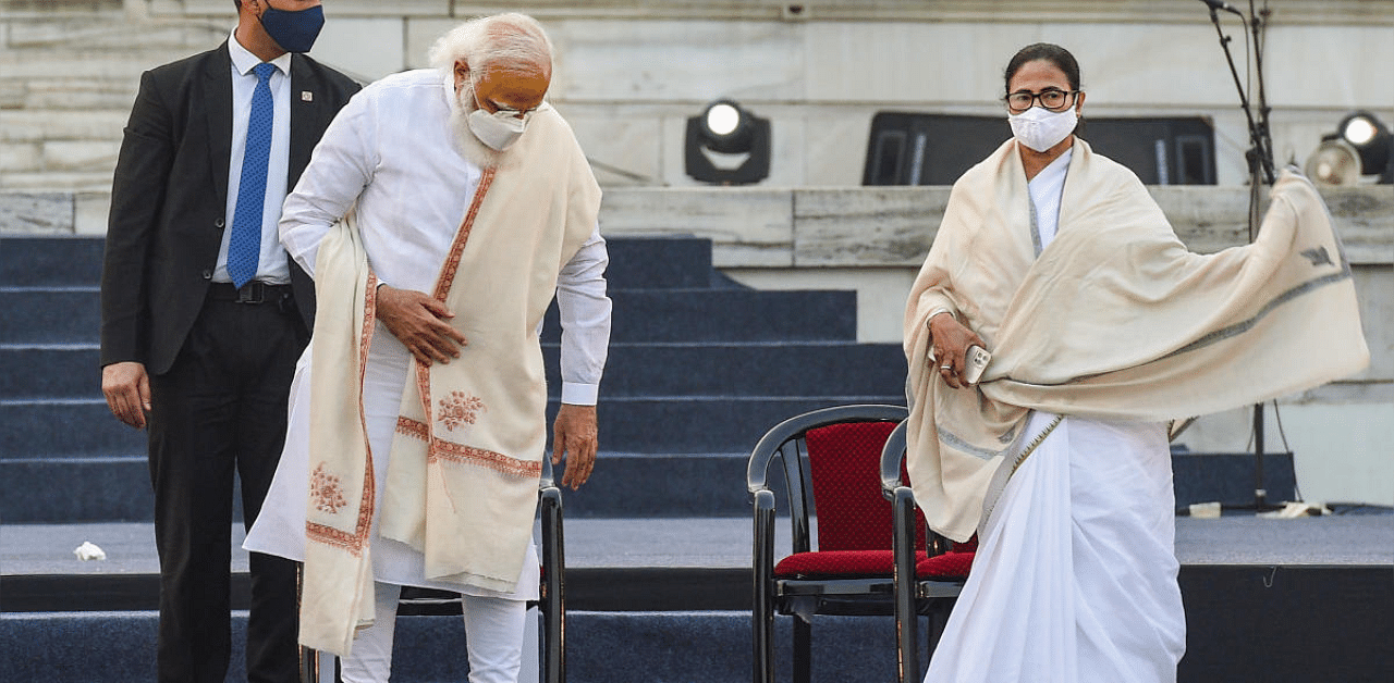 Prime Minister Narendra Modi with West Bengal Chief Minister Mamata Banerjee. Credit: PTI file photo. 