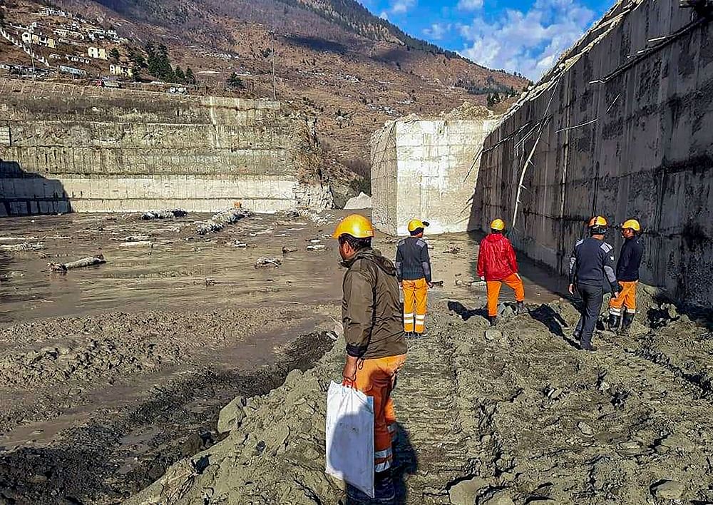 Rescue and restoration work underway near Tapovan tunnel, after a glacier burst. Credit: PTI Photo