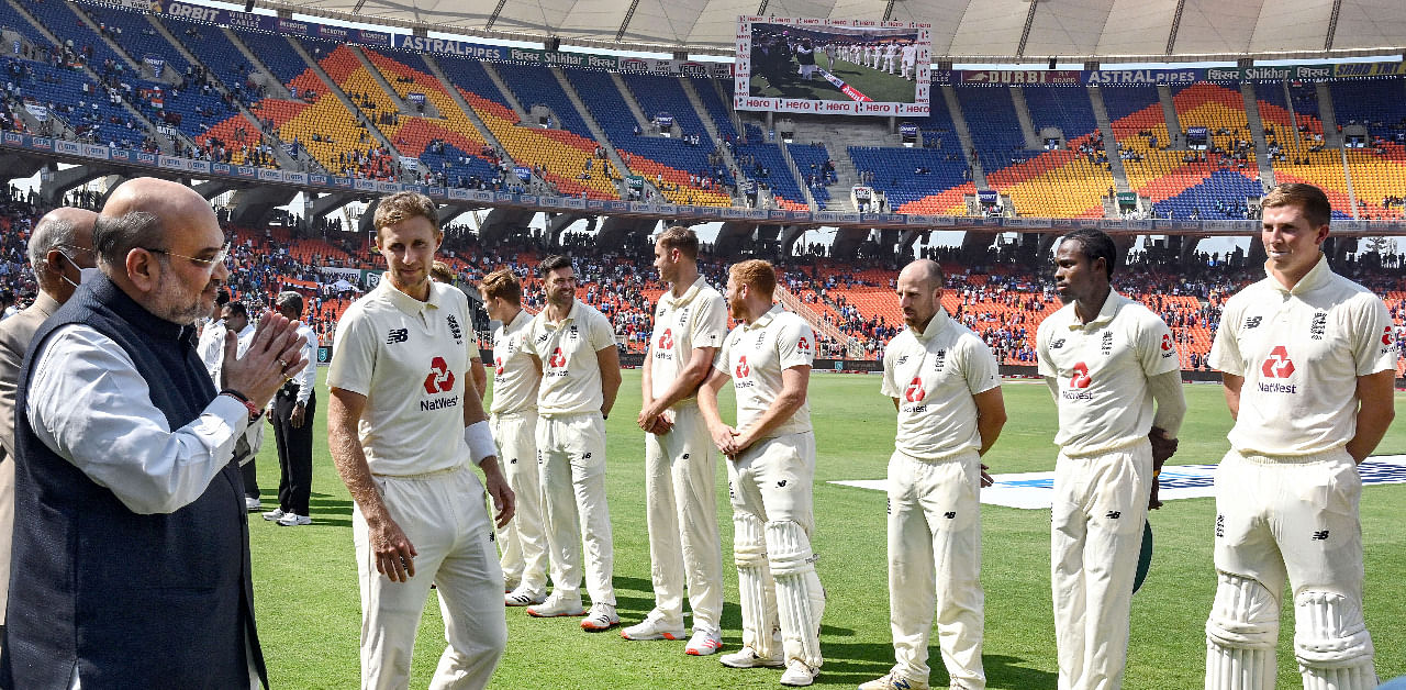 Amit Shah being introduced with the England cricket team by skipper Joe Root. Credit: PTI Photo