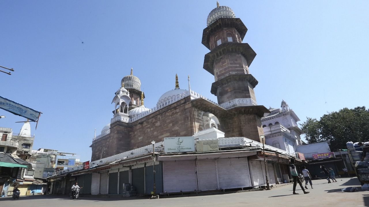 Shops remain closed during 'Bharat Bandh', called by the Confederation of All India Traders (CAIT) against rising fuel prices, new e-way bill and Goods and Services Tax (GST), in Bhopal. Credit: PTI Photo