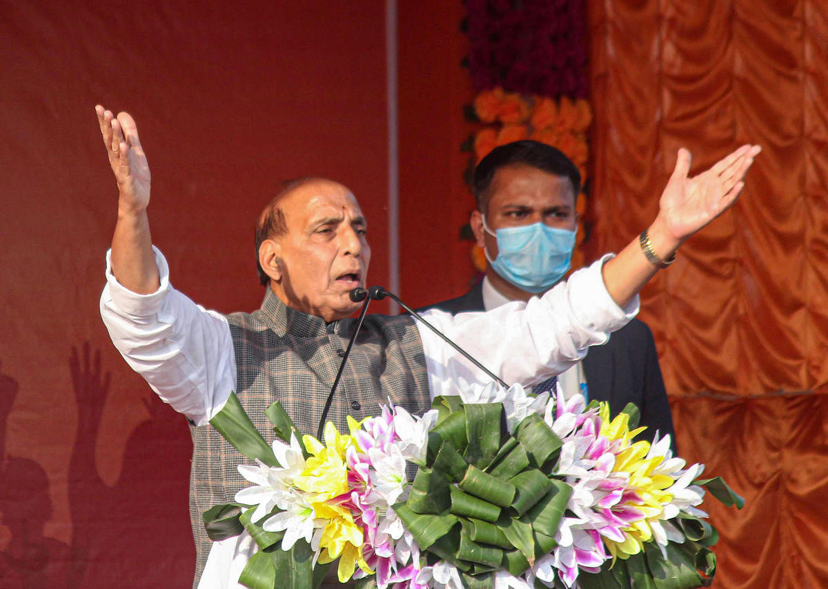 Union Defence Minister Rajnath Singh addresses a public meeting ahead of the state assembly elections, at Balurghat in South Dinajpur district of West Bengal. Credit: PTI photo. 