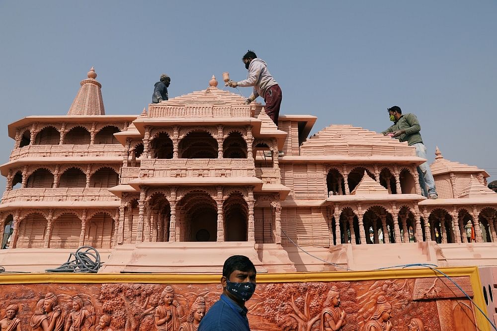 Workers give finishing touches to the model of the proposed Ram temple. Credit: Reuters Photo