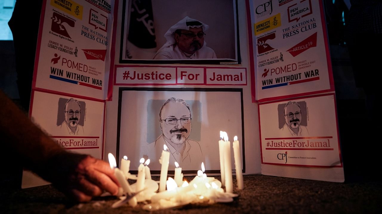 The Committee to Protect Journalists and other press freedom activists hold a candlelight vigil in front of the Saudi Embassy to mark the anniversary of the killing of journalist Jamal Khashoggi at the kingdom's consulate in Istanbul, Wednesday evening in Washington. Credit: Reuters File Photo