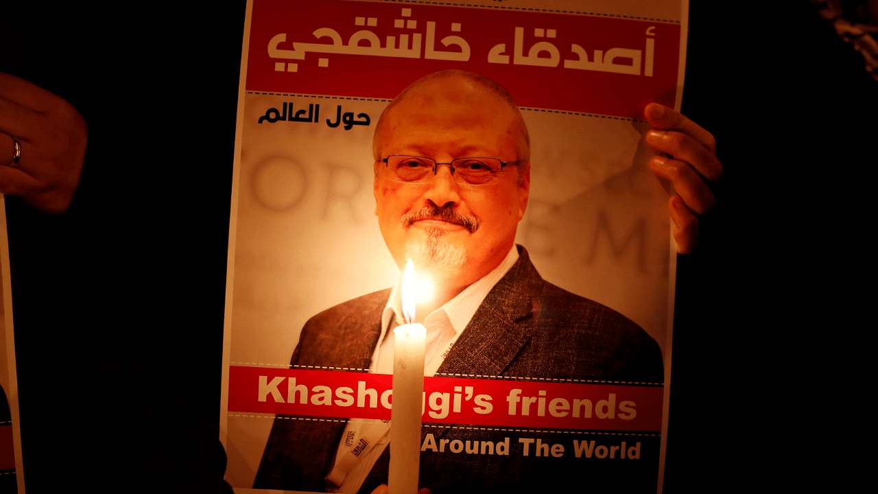 A demonstrator holds a poster with a picture of Saudi journalist Jamal Khashoggi outside the Saudi Arabia consulate in Istanbul. Credit: Reuters Photo