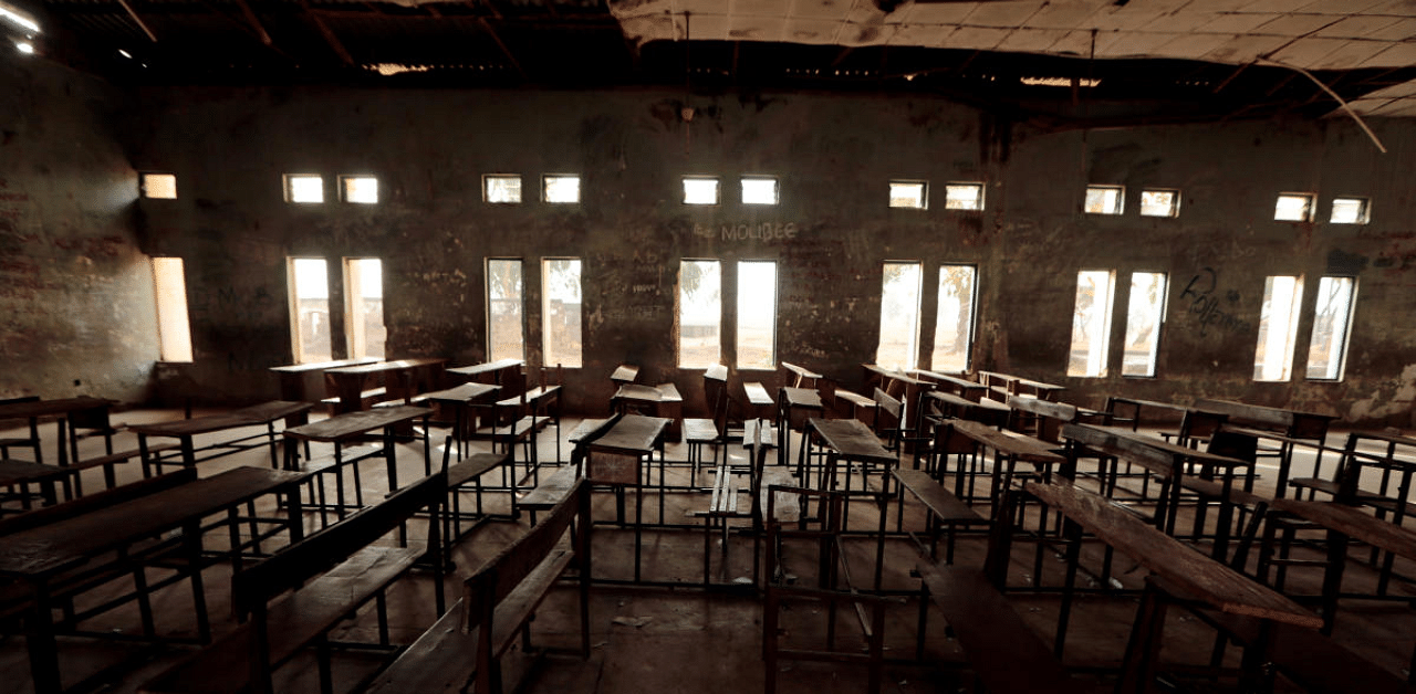 Classroom furniture is seen arranged inside the hall at the Government Science College in Kagara. Credit: Reuters Photo