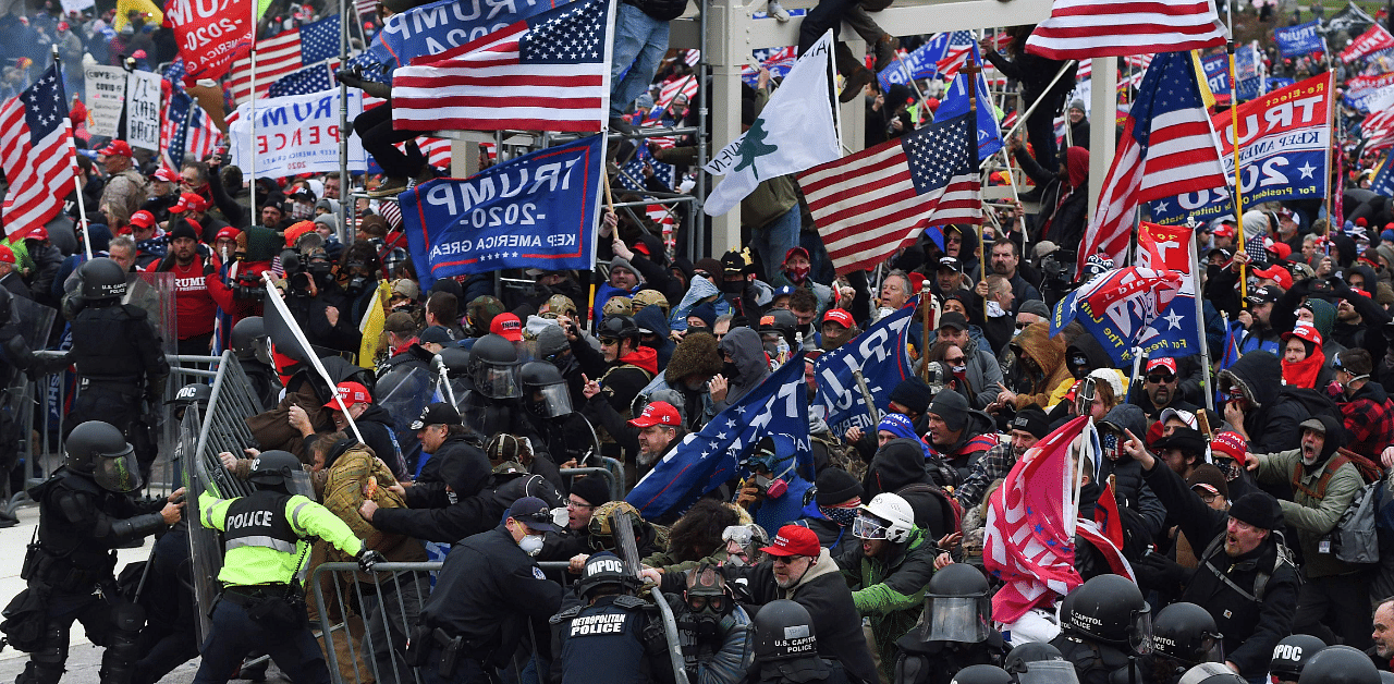 In this file photo Trump supporters clash with police and security forces. Credit: AFP Photo