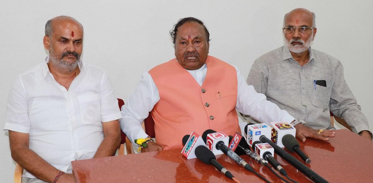 Minister for Rural Development and Panchayat Raj K S Eshwarappa addresses the media in Hassan. DH PHOTO