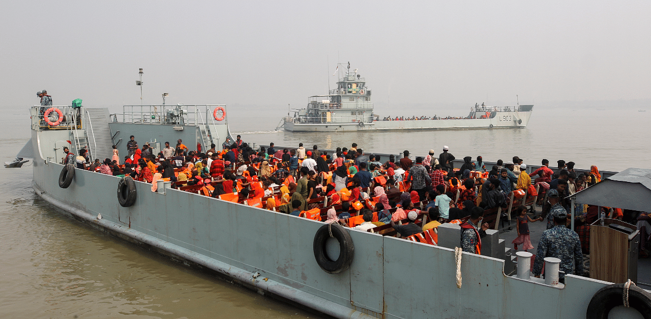 Rohingya refugees headed to the Bhasan Char island leave on navy vessels from the south eastern port city of Chattogram, Bangladesh. Credit: AP Photo