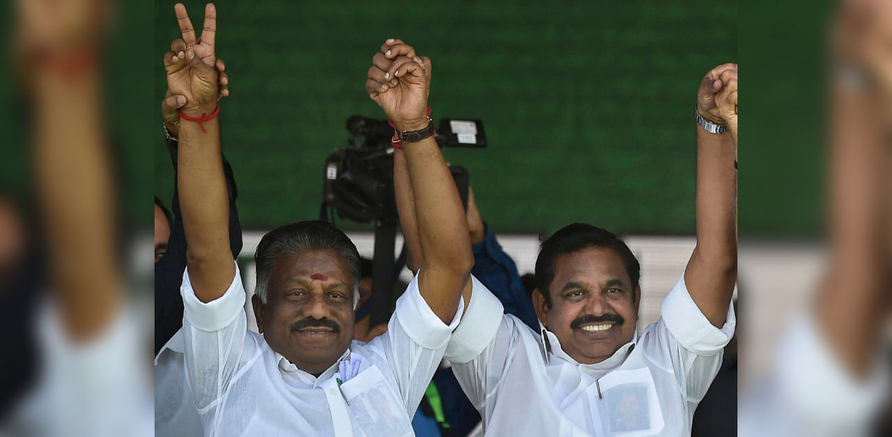Tamil Nadu Chief Minister Edappadi K Palaniswami and Deputy Chief Minister O Panneerselvam pay tribute to former late Tamil Nadu chief minister J Jayalalithaa. Credit: PTI File Photo