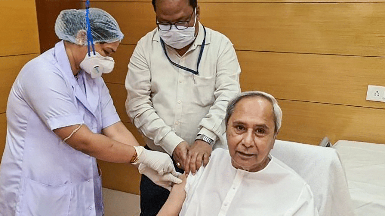 Odisha Chief Minister Naveen Patnaik being administered with Covid-19 vaccine, during a countrywide inoculation drive, in Bhubaneswar. Credit: PTI Photot