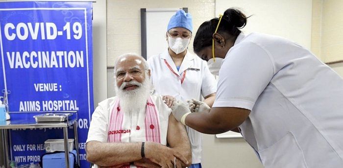 Prime Minister Modi took his first dose of the Covid-19 vaccine at AIIMS. Credit: PTI Photo