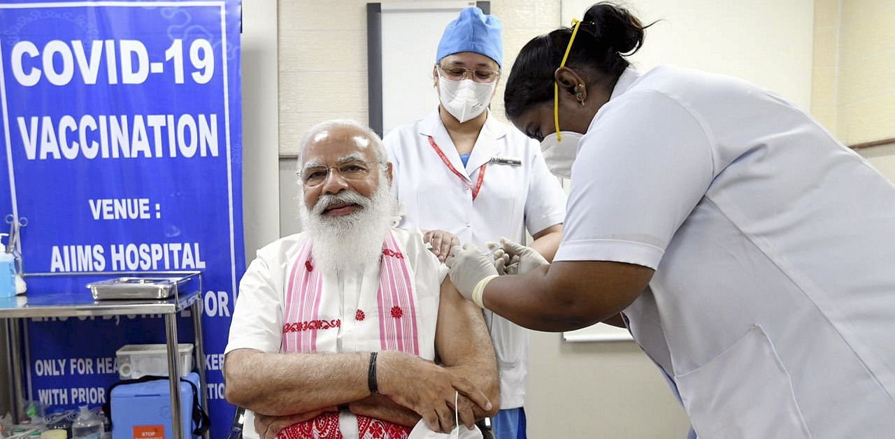 Prime Minister Narendra Modi is administered a Covid-19 vaccine in New Delhi. Credit: PTI Photo