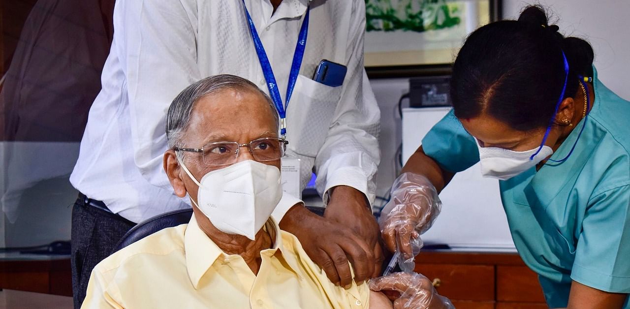 Narayan Murthy receives his first dose of COVID vaccine. Credit: PTI Photo