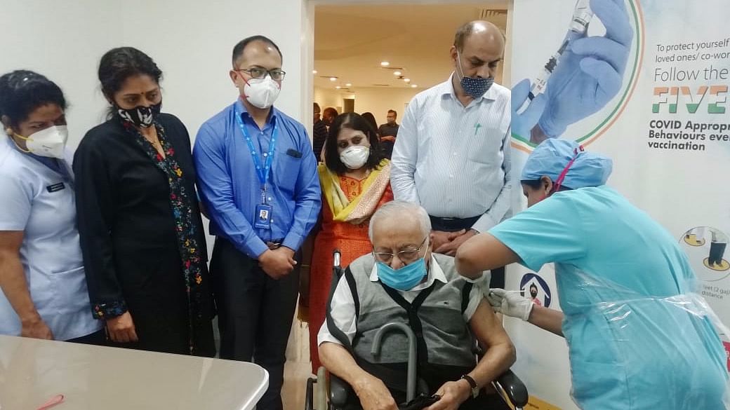97-year old man became the first to receive the Covid-19 vaccine at Manipal Hospitals in Bengaluru. Credit: Manipal Hospitals