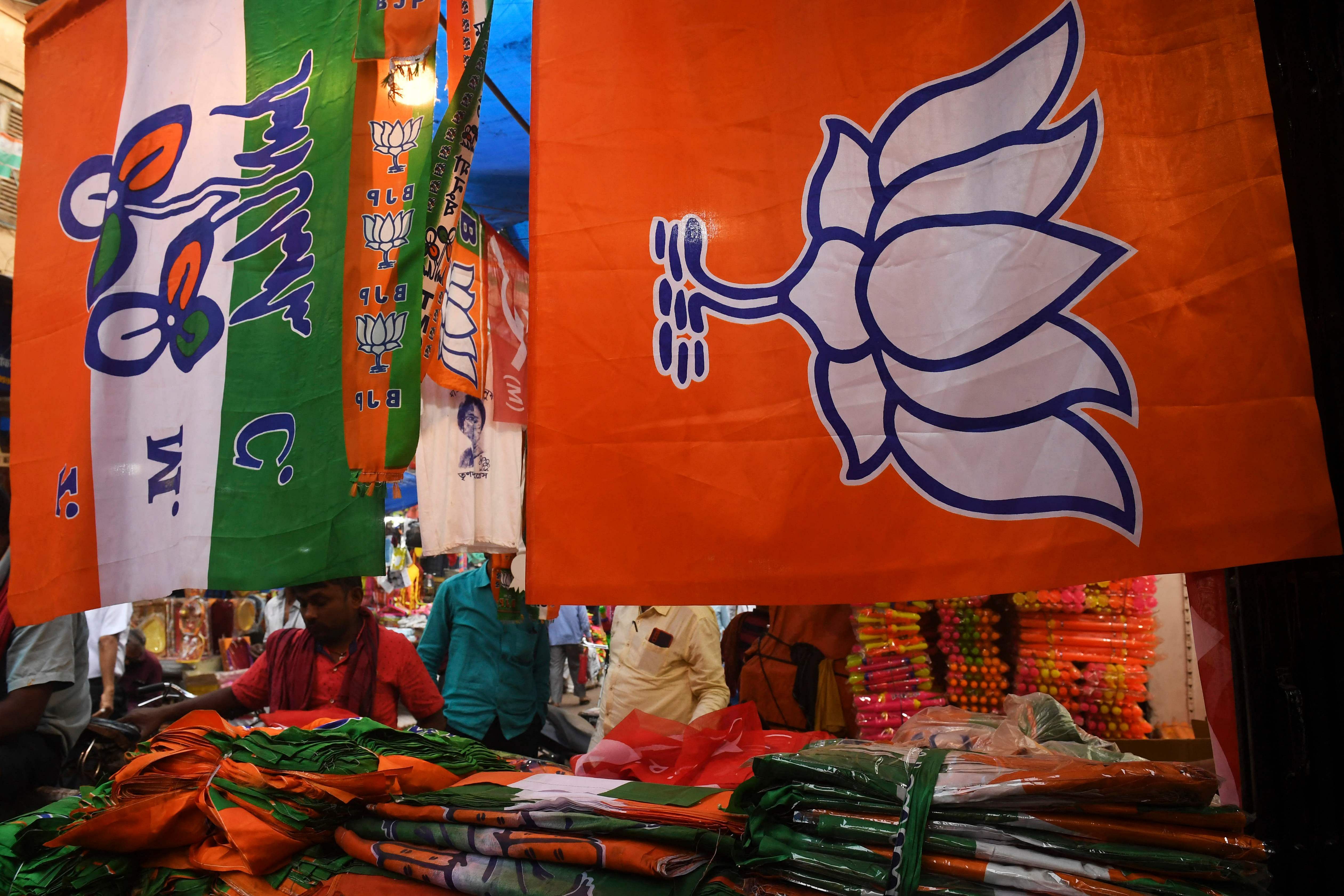 The BJP further urged the EC to immediately stop the TMC leaders from distributing money to voters with immediate effect. Representative image/Credit: AFP Photo