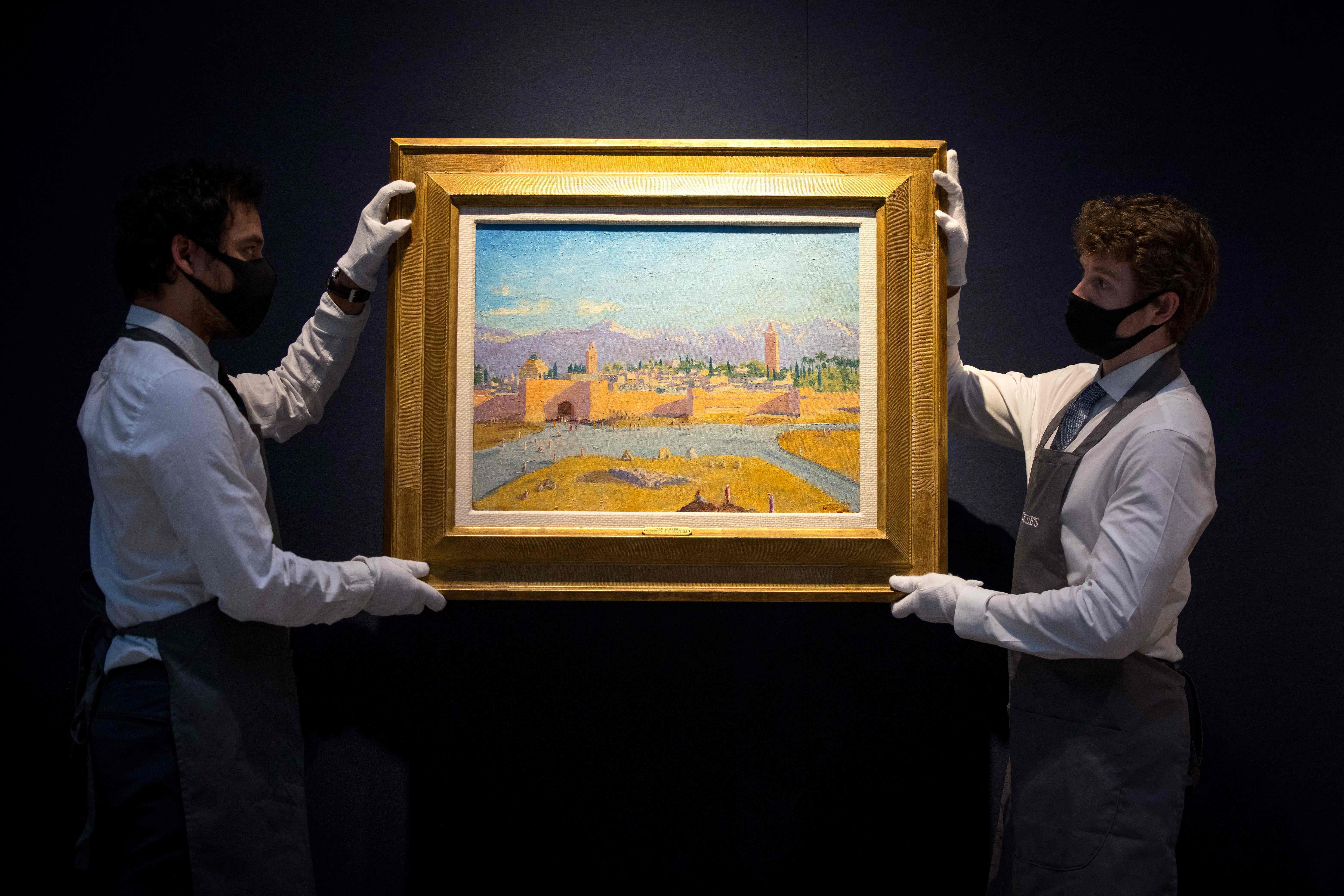 Artwork titled ''Tower of Koutoubia Mosque'' by Winston Churchill during a photocall at Christie's auction house in London. - ''Tower of Koutoubia Mosque'' was sold for a price of 8,285,000 British pounds (11,590,000 USD, 9,577,000 Euros), during the Modern British Art Evening Sale at Christie's auction house in London. Credit: AFP File Photo