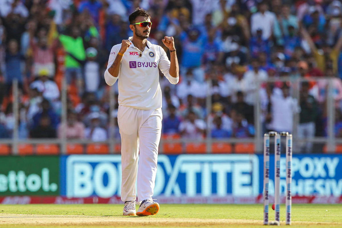 Indian bowler Axar Patel celebrates the dismissal of England's Jofra Archer on the first day of the 3rd cricket test match between India and England, at Narendra Modi Stadium in Ahmedabad, Wednesday, Feb. 24, 2021. Credit: PTI Photo