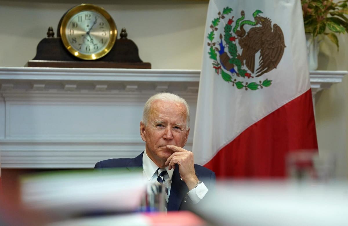 U.S. President Joe Biden listens during a virtual bilateral meeting with Mexican President Andres Manuel Lopez Obrador from the White House in Washington, U.S., March 1, 2021. Credit: REUTERS Photo
