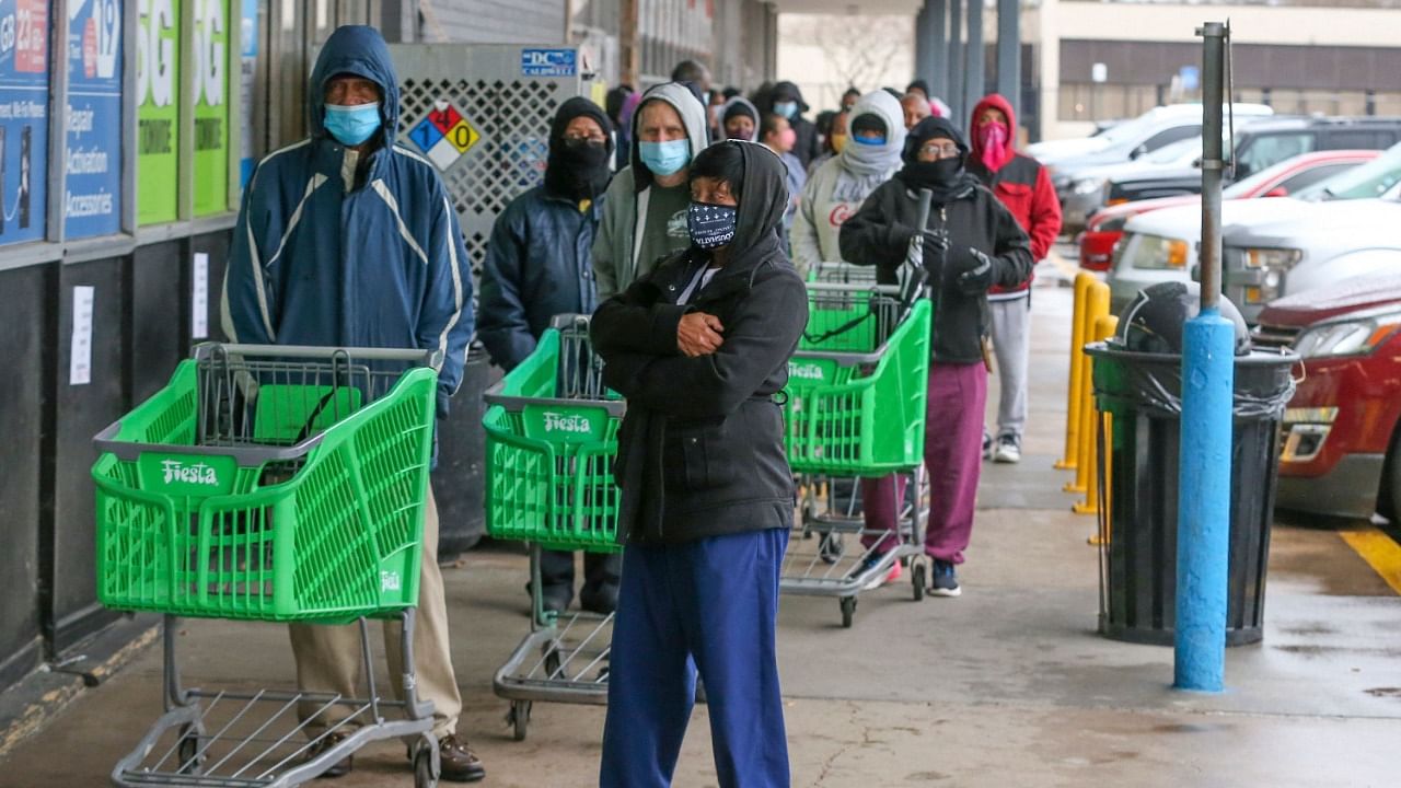 Texas Governor Greg Abbott lifted a state mask mandate on March 2, 2021, and said he was authorising businesses restricted because of the coronavirus pandemic to open "100 percent." Credit: AFP Photo