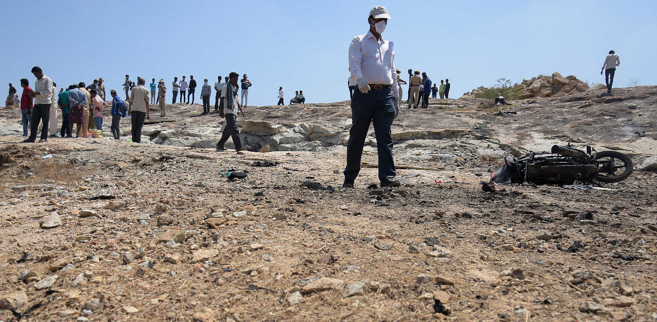 An official inspects at the spot where gelatin sticks exploded killing 6-people at a quarry site at Hirenagaveli village, Chikkaballapur district. Credit: DH Photo/Pushkar V