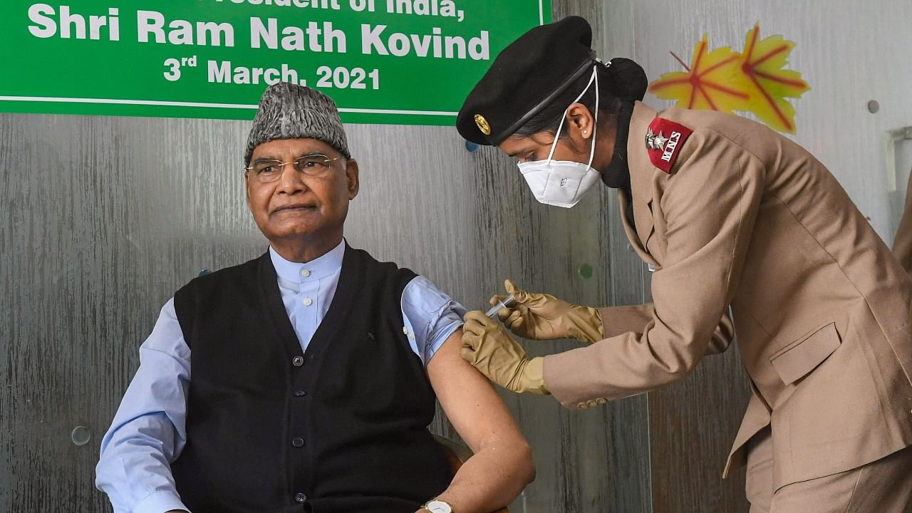  President Ram Nath Kovind receives the first dose of COVID-19 vaccine, during the second phase of a countrywide inoculation drive, in New Delhi. Credit: PTI Photo