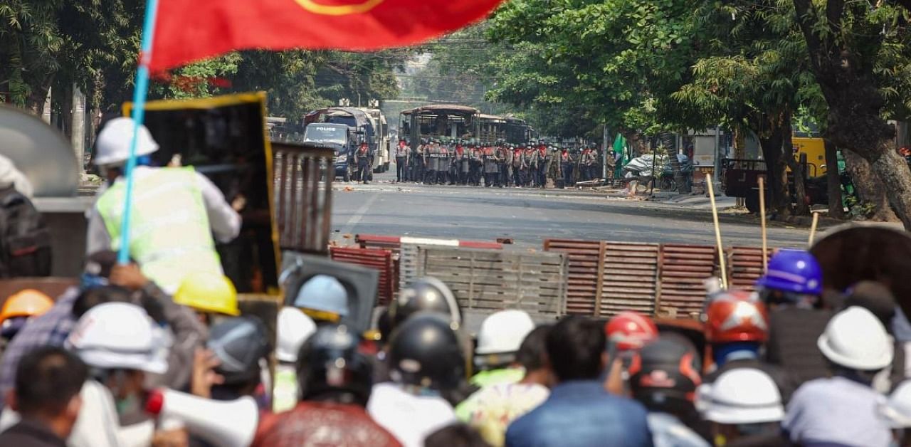  Protesters face off with police during a demonstration against the military coup in Mandalay on March 3, 2021. Credit: AFP Photo