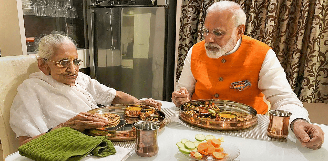 Prime Minister Narendra Modi meets his mother Hiraben. Credit: PTI Photo