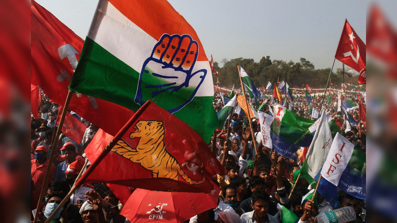 Supporters shout slogans as they attend a joint rally of the Congress, Left and Indian Secular Front (ISF) parties ahead of the state legislative assembly elections, in Kolkata on February 28, 2021. Credit: AFP Photo