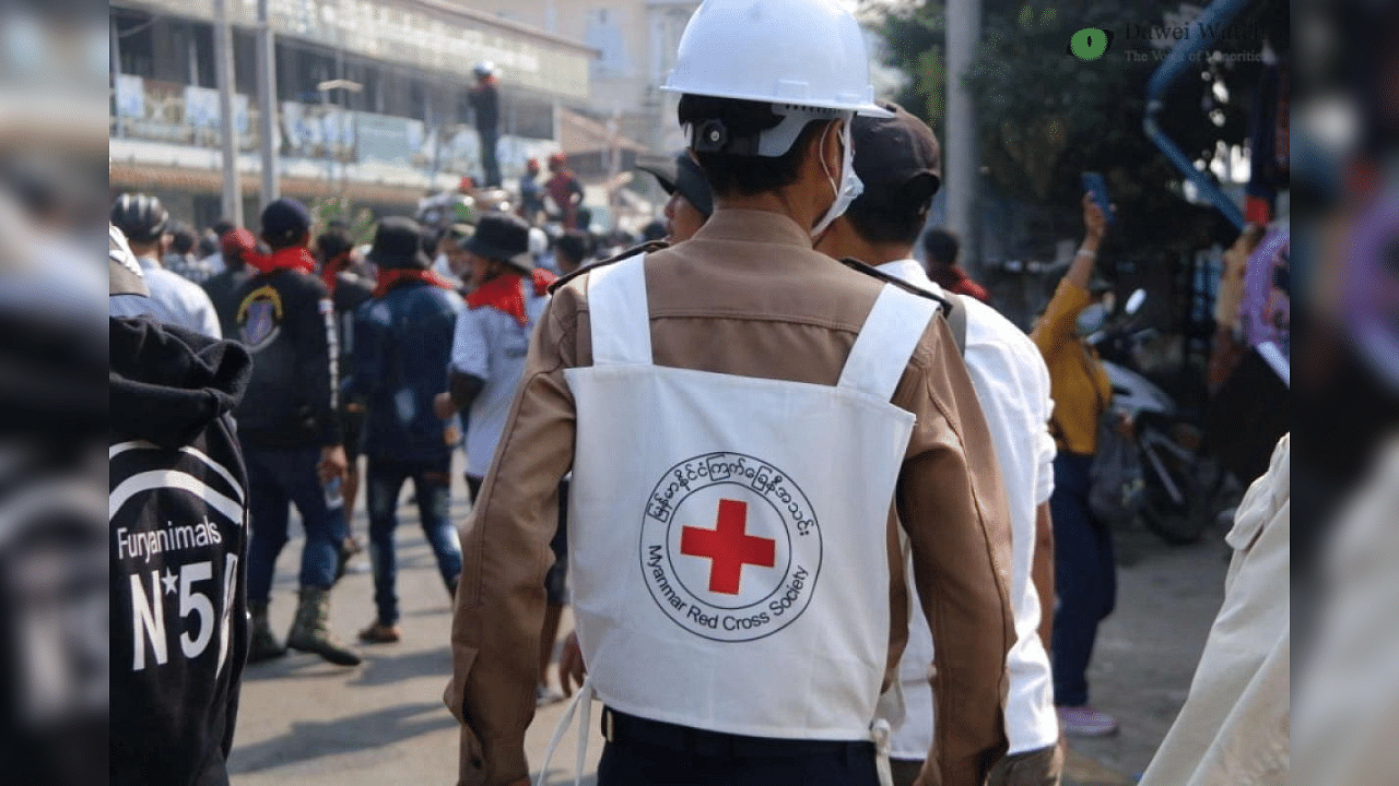 A member of Red Cross walks amid protests against the military coup in Dawei, Myanmar February 28, 2021 in this picture obtained from social media. Credit: Reuters 