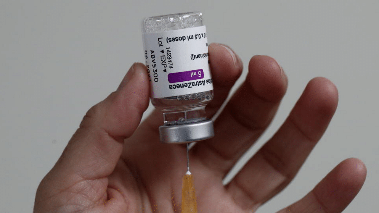 A healthcare worker draws a dose of the AstraZeneca Covid-19 vaccine. Credit: Reuters File Photo