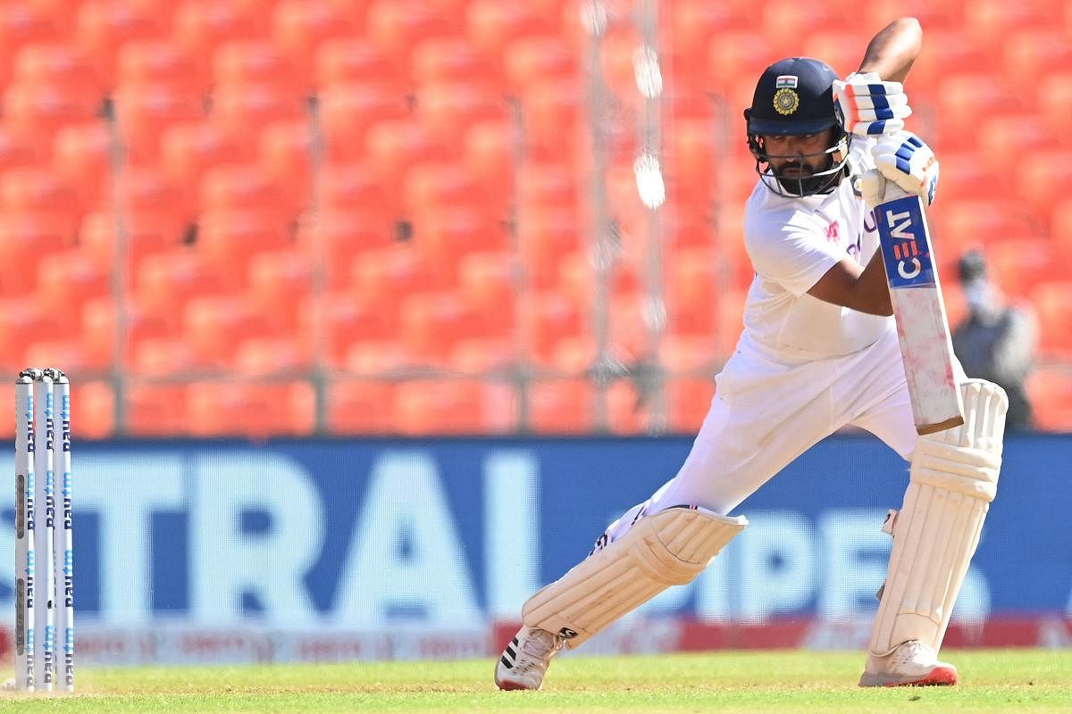 With England bowling tight lines and lengths, India's Rohit Sharma played an uncharacteristic 144-ball 49, proving that he can even play the waiting game. AFP 