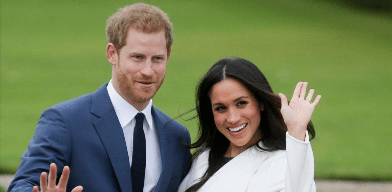 Harry and his fiancée US actress Meghan Markle. Credit: AFP file photo. 