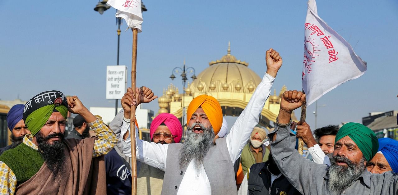 Farmers have been camping at several Delhi border points, demanding a complete repeal of three farm laws and a legal guarantee on MSP for their crops. Credit: PTI Photo