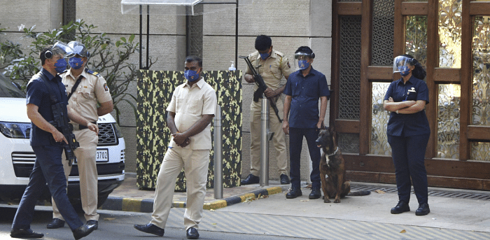 Police personnel guard outside industrialist Mukesh Ambai's residence Antilla. Credit: PTI Photo 